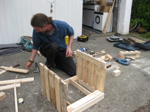 Andrew constructing a recycled planter
